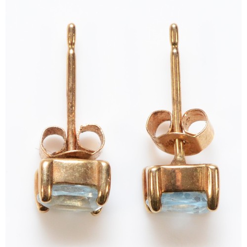 729 - A pair of 9ct gold aquamarine earrings with scroll backs, 0.8g