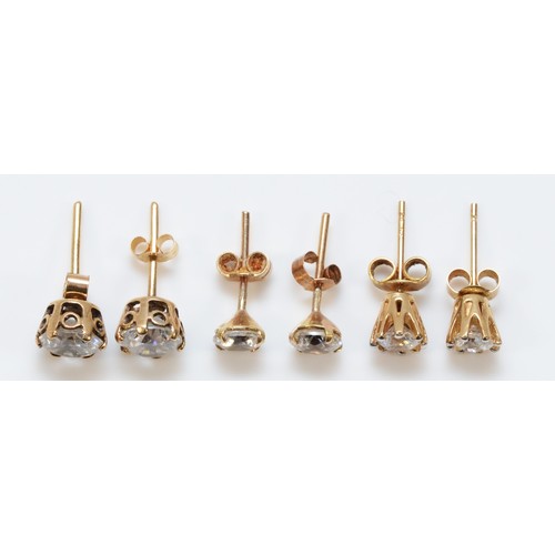 734 - Three pairs of 9ct gold white gemstone earrings with scroll backs, 3g