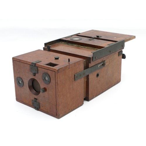 A late 19th century mahogany cased Mars Detective camera,  apparently unsigned, the body stamped 1828, 31, 6, with 12 plate rotary disc on the top, for 12 9 x 12cm plates, lacking plate changer, 14 x 11 x 26cm extended