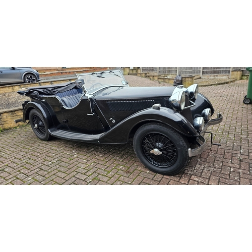 1936 Riley Lynx Tourer, 1596cc. Registration number CON 59. Chassis number 27L 5887. Body number 5443. Engine number TBC.
Sold with the V5C, keys, history folder.
Produced from 1936 until 1938 when Nuffield took over the company, the Riley 1½-litre, is a range of cars that were available with saloon, touring, and sports/racing coachwork,
The car is powered by a four-cylinder 1,496 cc with one or two Zenith carburettors. It was advanced for its day with twin camshafts mounted high in the engine block, cross flow head on some versions, and Zenith or twin SU carburettors. A Wilson re-selector gearbox is used.
The chassis had half-elliptic leaf springs all round and drive was to the rear wheels through either a four-speed preselector or manual gearbox. Girling rod brakes were fitted.
At launch three body styles were available: the Kestrel 4 light fastback saloon, the Falcon saloon and the Lynx open tourer. Of all the new 1½ Litre models, the Lynx was the least changed from its 12/4 predecessor. The chassis featured the same upgrades as the Falcon and Kestrel which were the only other bodystyles carried forward, but the Lynx body was carried over virtually unchanged. It remained the only 4-seater open car in the range, although by the end of 1937 production had almost ceased as the publics love of open 4-seaters had faded.
Conny has been owned by our vendors father from the mid 1980's until his passing a 4 years ago. He was a very competent engineer and had a collection of Marston Sunbeam's that Spicers sold in 2020. 
Every winter he would take the Lynx off the road and strip her done for a thorough check over and service. This is evidenced by the good condition of the chassis and running gear, when photograph we released the hand brake and she effortlessly was pushed out. The engine has been turned over by hand but no effort has been made to start her. The ash frame appears to have been replaced in the rear section but the front is original with both sides having the body number stampings.
The body now has considerable paint patina but appears to have no corrosion. The hood is in OK condition, as is the hood bag and full tonneau; there are thee window panels for each side.