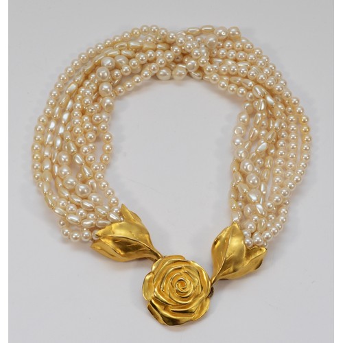 3 - Givenchy, an imitation pearl floral necklace.