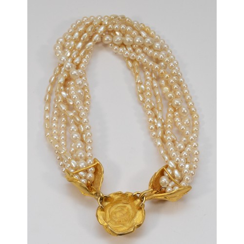 3 - Givenchy, an imitation pearl floral necklace.