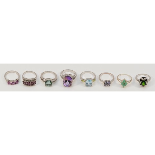 18 - Eight silver and gemset rings, including tanzanite, sizes O/P, 30gm