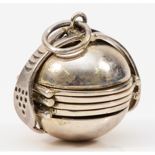 20 - An unmarked silver concertina ball locket pendant, diameter18mm, 19gm