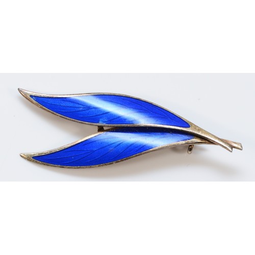 23 - N.M. Thune, a Norwegian silver gilt and blue enamel leaf brooch, 62mm, 7gm.
very small chip on the e... 