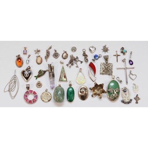 29 - A collection of silver and gemset pendants, to include malachite, 162gm