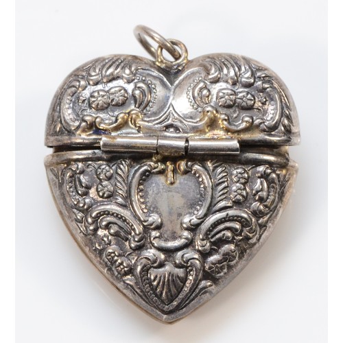 33 - A 925 silver heart shape locket, 35mm, 14gm