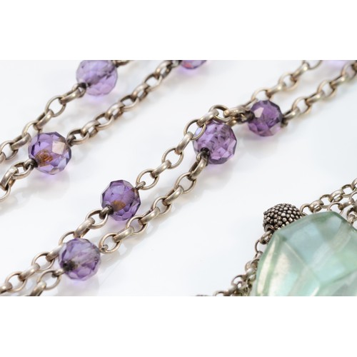 51 - A silver and faceted amethyst necklace, 76cm and a blue glass and silver necklace 69gm