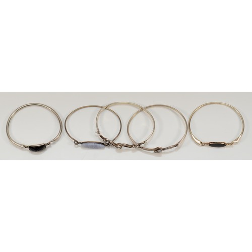 57 - Five silver and stone set bangles, 48gm