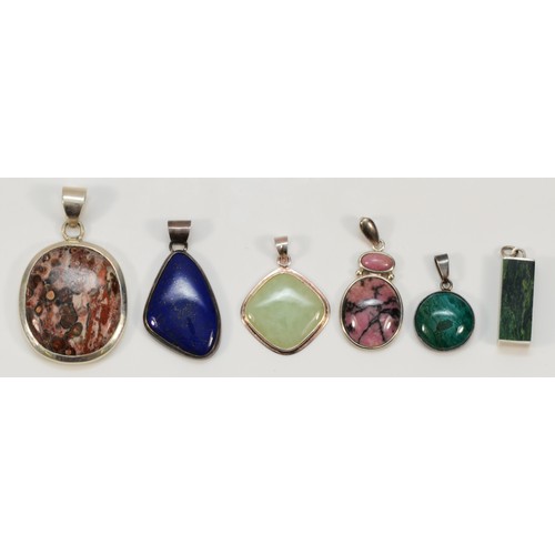 61 - Six silver mounted hardstone pendants, 58gm