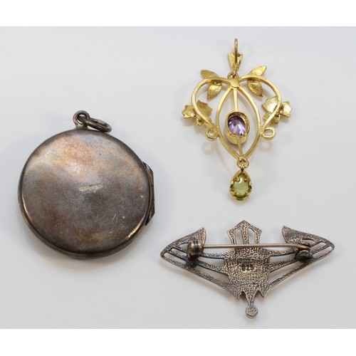 67 - A silver Art Nouveau style locket, 29mm, an unmarked silver gilt opal and amethyst pendant and a 925... 