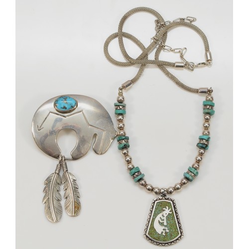 75 - A Native American silver and turquoise matrix two feathers brooch, by CP length 7.5cm and a silver a... 