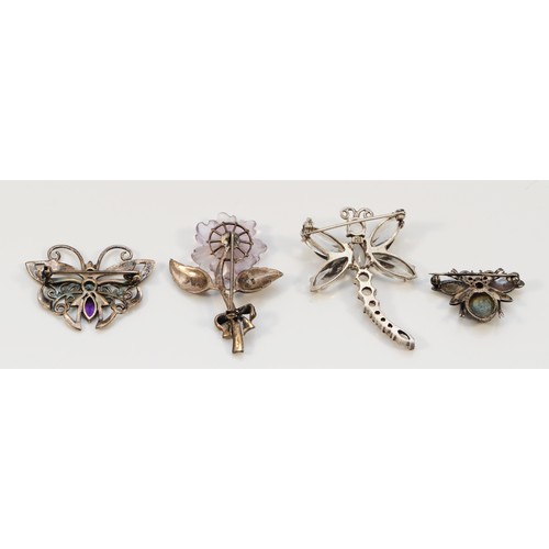 80 - A silver and marcasite floral brooch, 50mm and three other silver brooches, 31gm