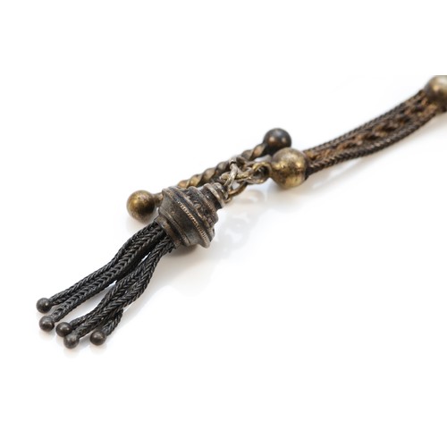 83 - An unmarked Victorian silver albertina with tassel, 20cm, 22gm