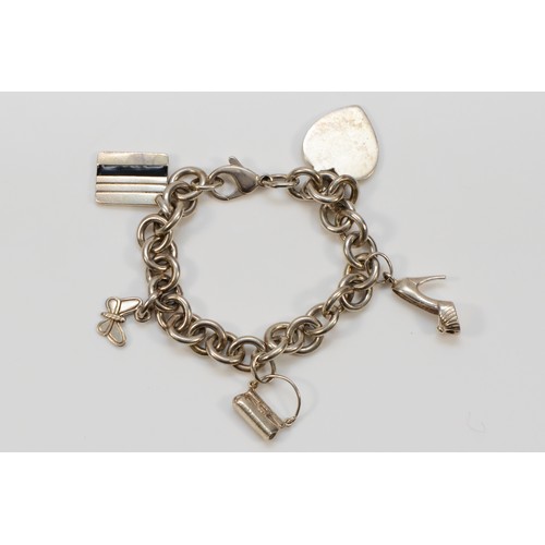 84 - Tiffany & Co., a silver curb link bracelet, London 2004, with silver Links of London charms, 18.5cm,... 