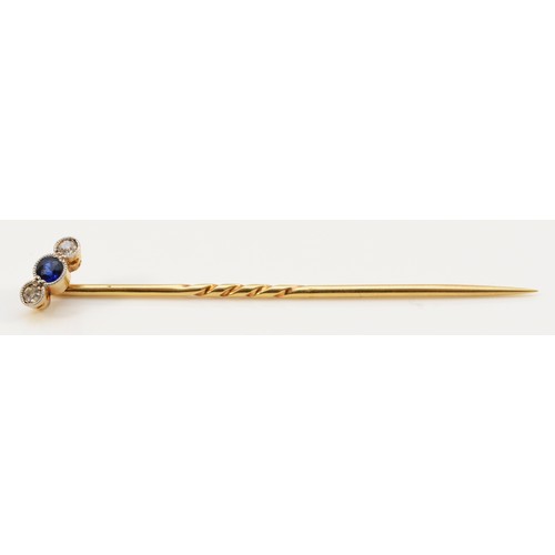 118 - An unmarked 18ct gold antique sapphire and diamond stick pin, one diamond has a chip to the surface,... 