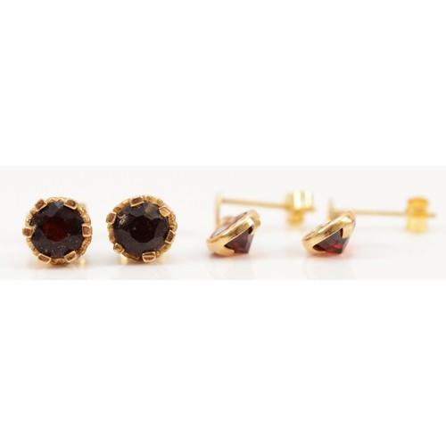 129 - Two pairs of 9ct gold garnet earrings with scroll backs, 2.1g