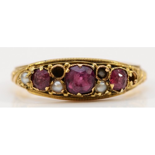 131 - A Victorian 15ct gold garnet and seed pearl dress ring, Birmingham 1870, three pearl settings vacant... 