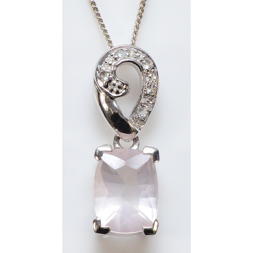 142 - A 9ct white gold pink and white gemstone pendant with a chain, 20mm pendant drop, 2.9g