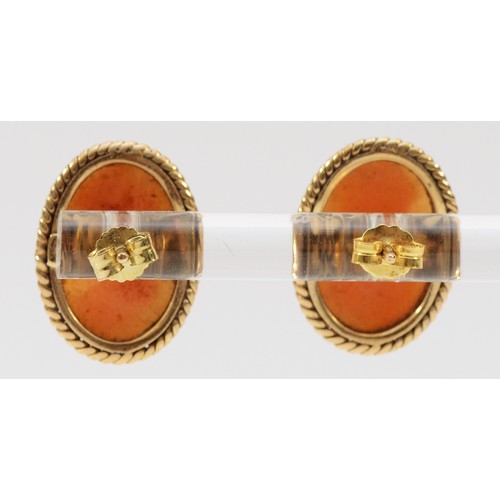 143 - A pair of 9ct gold shell cameo earrings with scroll backs, 15mm x 12mm, 3.4g