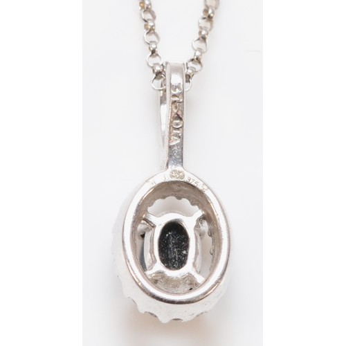 151 - A 9ct white gold sapphire and diamond cluster pendant with a chain, 17mm drop, 3.1g