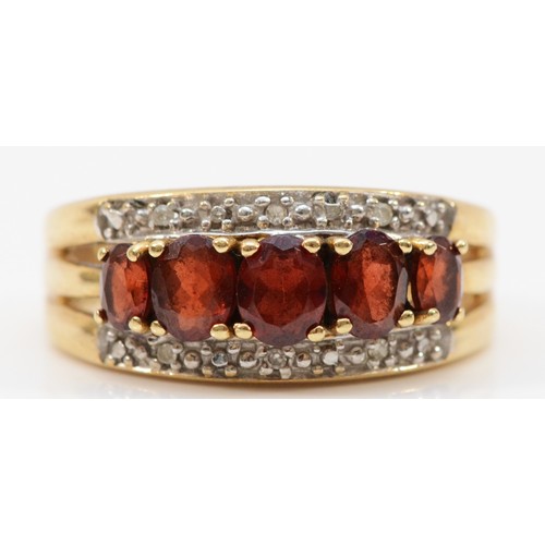 168 - A 9ct gold diamond and garnet three row dress ring, P, 4.4g