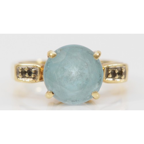 169 - A 9ct gold blue and white gemstone dress ring, 10mm blue gemstone, M 1/2, 4.1g