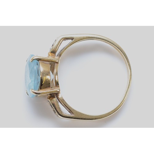 169 - A 9ct gold blue and white gemstone dress ring, 10mm blue gemstone, M 1/2, 4.1g