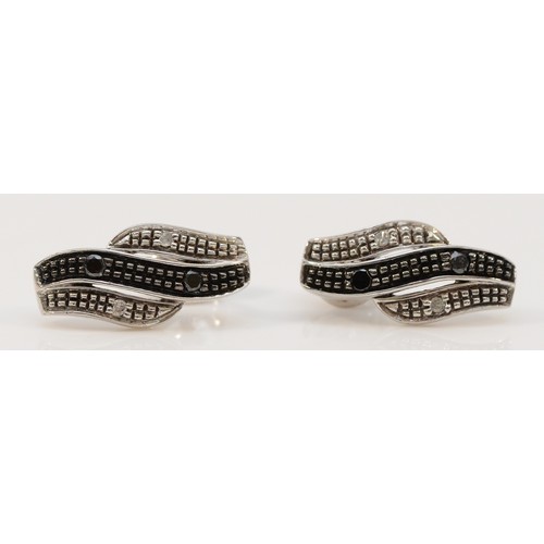 187 - A pair of 9ct white gold diamond and black gemstone earrings with scroll backs, together with a matc... 