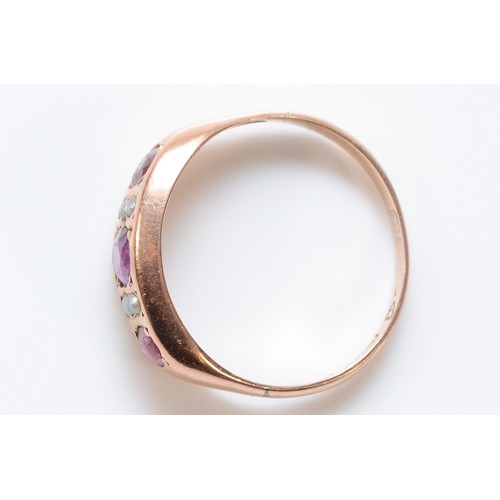 188 - A 9ct rose gold ruby and seed pearl dress ring, K, 1.7g