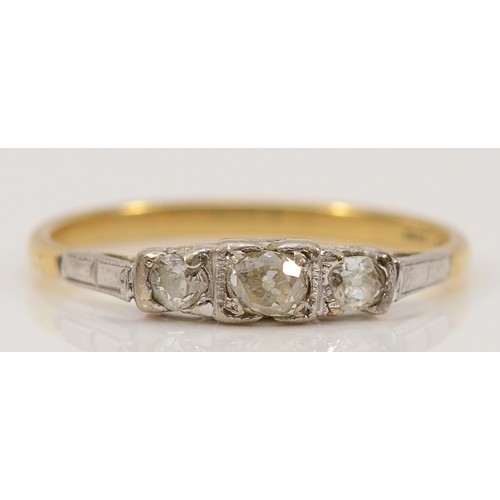 191 - An 18ct gold old mine cut diamond three stone ring, T 1/2, 2.6g