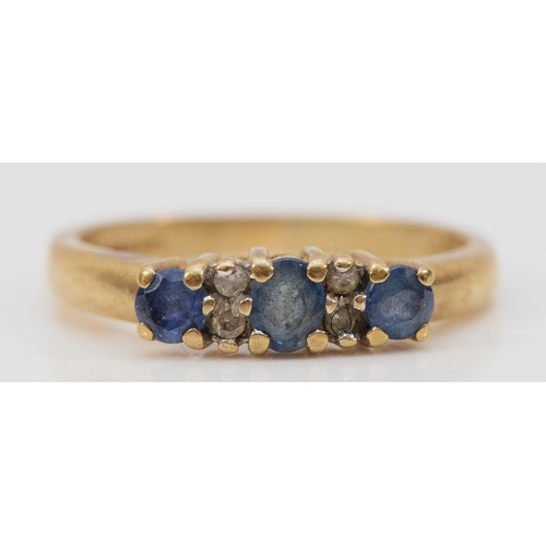 202 - A 9ct gold sapphire and diamond seven stone ring, N 1/2, 2.5g