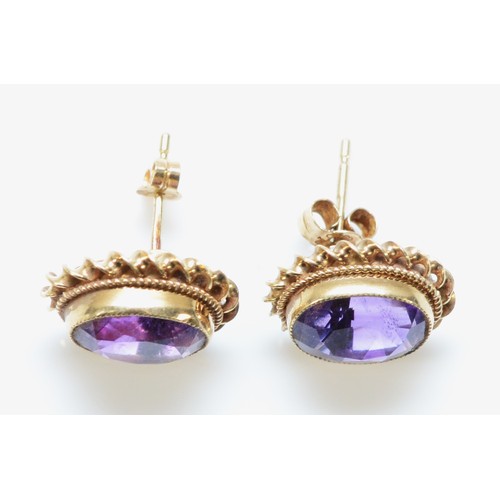 206 - A pair of 9ct gold amethyst earrings with scroll backs, 12mm x 10mm, 2.4g