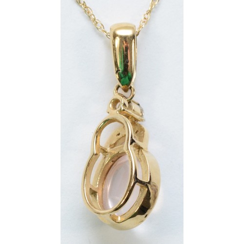 219 - A 9ct gold cabochon cut rose quartz and white gemstone pendant with a chain, 20mm pendant length, 4.... 