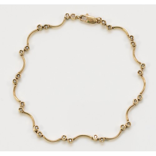 230 - A 9ct gold and diamond bracelet, 20cm, 7.1g