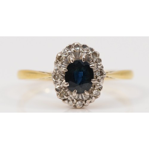 236 - An 18ct gold sapphire and diamond cluster ring, Q, 3g