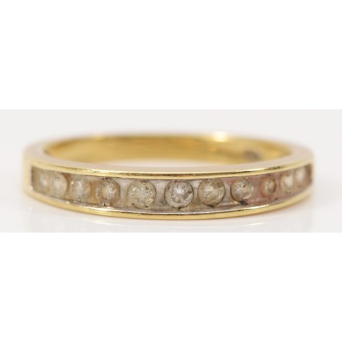 242 - A 9ct gold channel set diamond half eternity ring, O, 2.1g