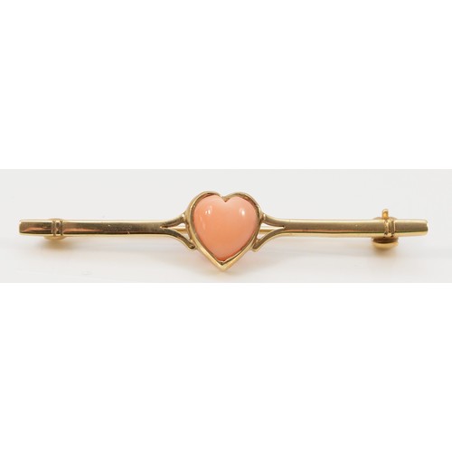 250 - A 9ct gold coral heart bar brooch, London 1990, 50mm across, 2.9g