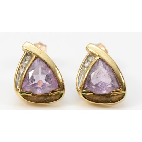 267 - A pair of 9ct gold amethyst and diamond earrings with scroll backs, 2.7g