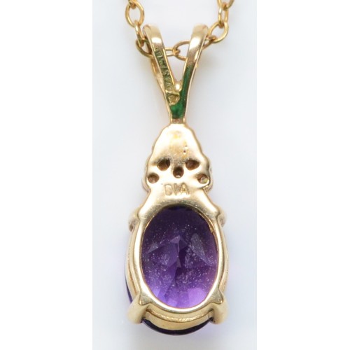 270 - A 9ct gold diamond and amethyst pendant with a chain,  17mm drop, 2g