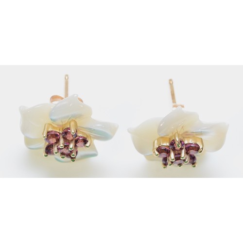 279 - A pair of 9ct gold mother of pearl and pink gemstone floral earrings with scroll backs, 15mm across,... 