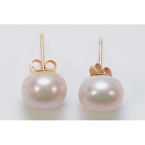 289 - A pair of 14k gold cultured pearl earrings with scroll backs, 2.2g