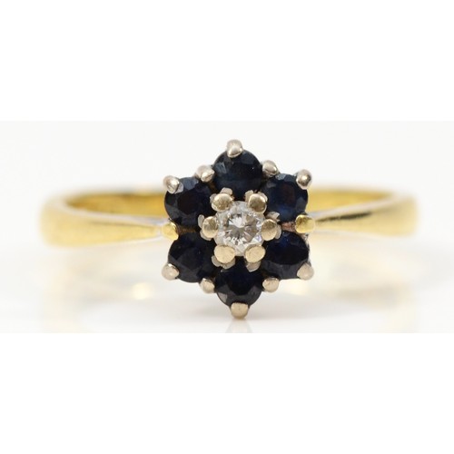 296 - An 18ct gold sapphire and diamond floral cluster ring, J, 2.6g