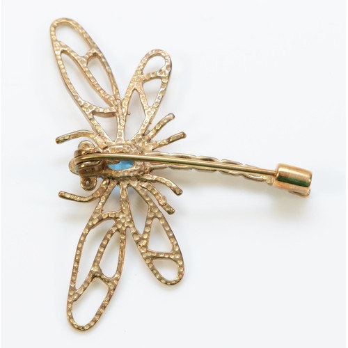 308 - A 9ct gold diamond and blue topaz dragonfly brooch, 40mm across, 3.6g