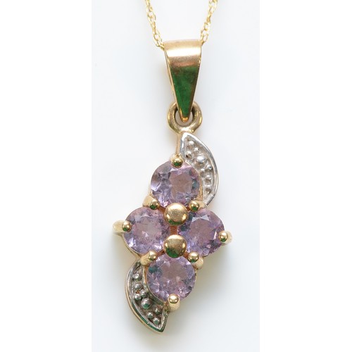 310 - A 9ct gold amethyst pendant with a chain, 18mm pendant, 1.9g