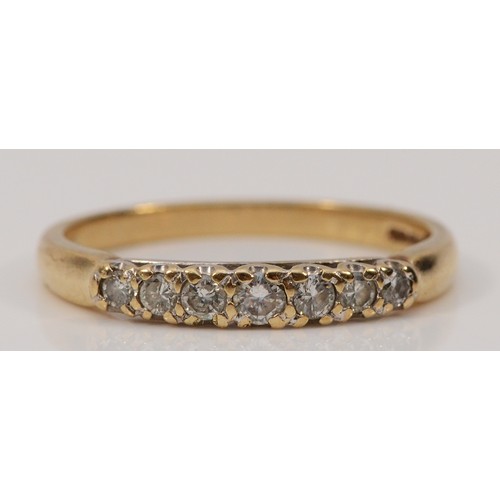 314 - A 9ct gold diamond seven stone half eternity ring, P, 2g