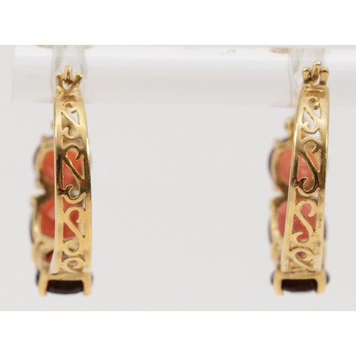 315 - A pair of 9ct gold garnet hoop earrings, 15mm drop, 2.6g