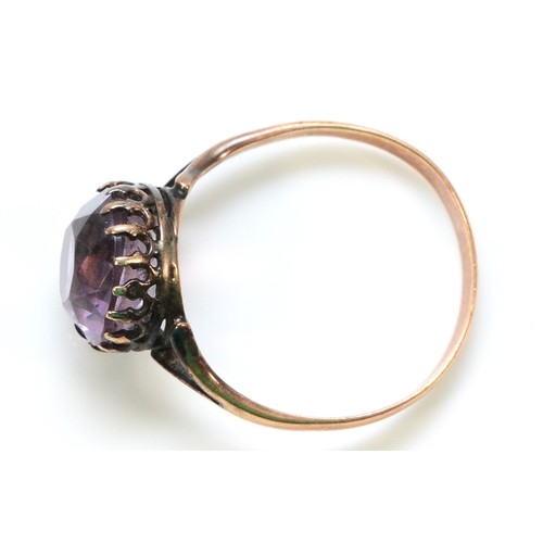 317 - An unmarked 15ct rose gold amethyst dress ring, 8mm diameter amethyst, K 1/2, 1.7g