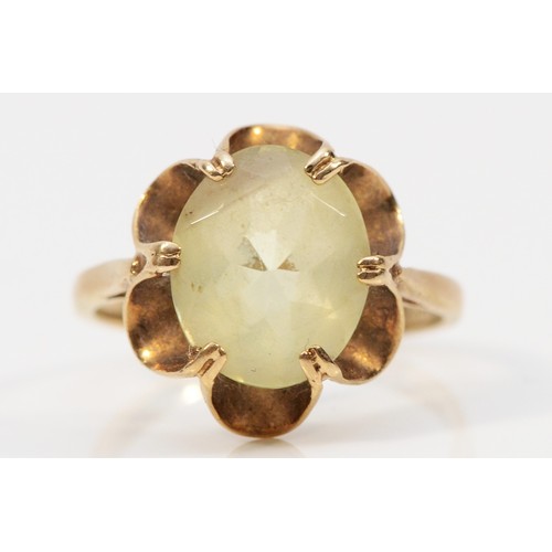 324 - A 9ct gold yellow gemstone dress ring, 12mm x 10mm gemstone, P 1/2, 3.2g