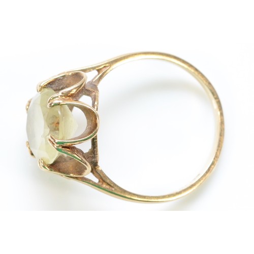 324 - A 9ct gold yellow gemstone dress ring, 12mm x 10mm gemstone, P 1/2, 3.2g